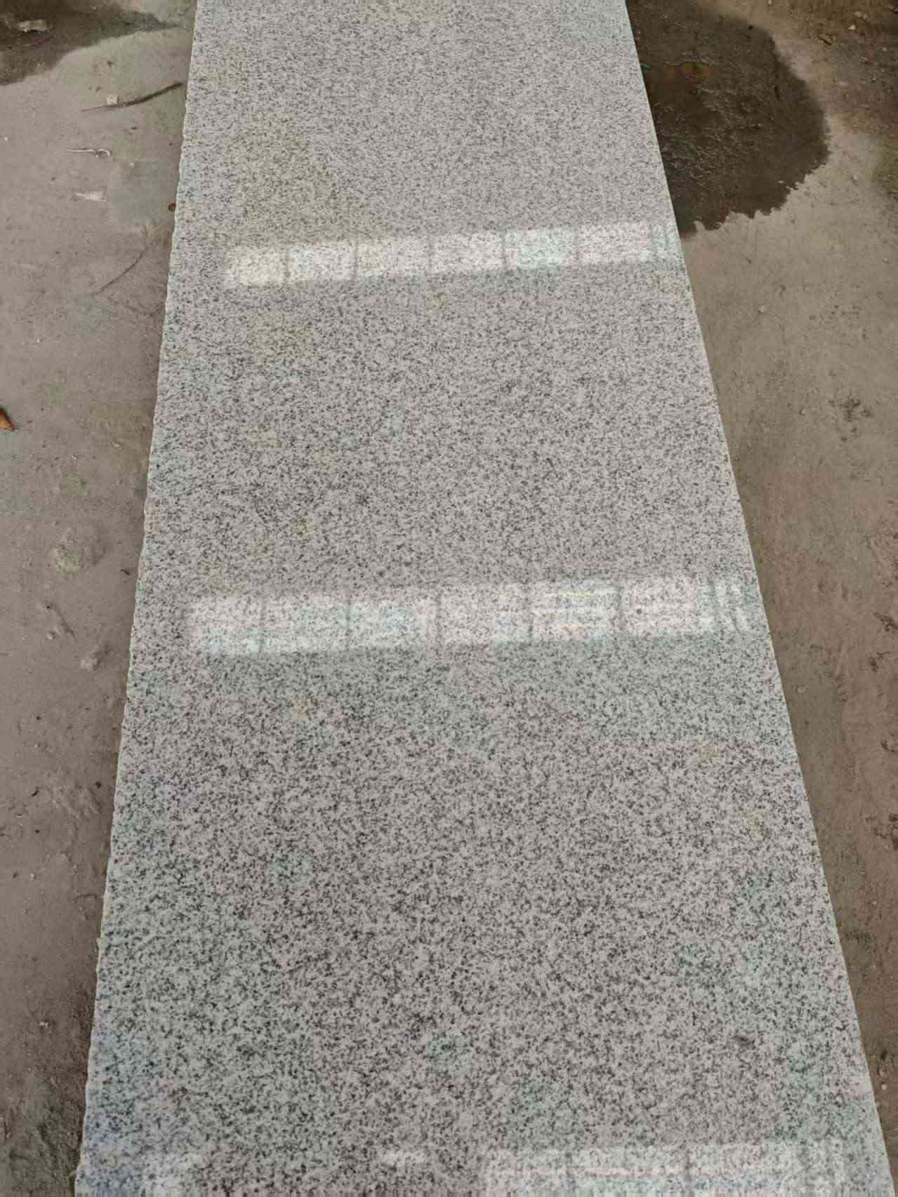 保山芝麻白光面毛板